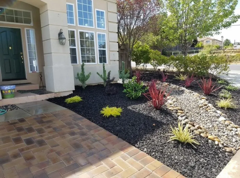 Custom outdoor landscaping for year-round maintenance in Clementon, NJ by CDM Lawn and Landscaping