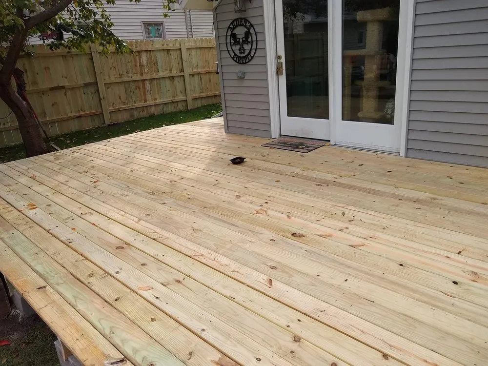 Professional lawn mowing service for residential properties across Oshkosh, WI - C&E Contracting