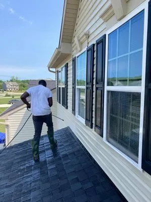 C&E Landscaping And Powerwash Service Logo