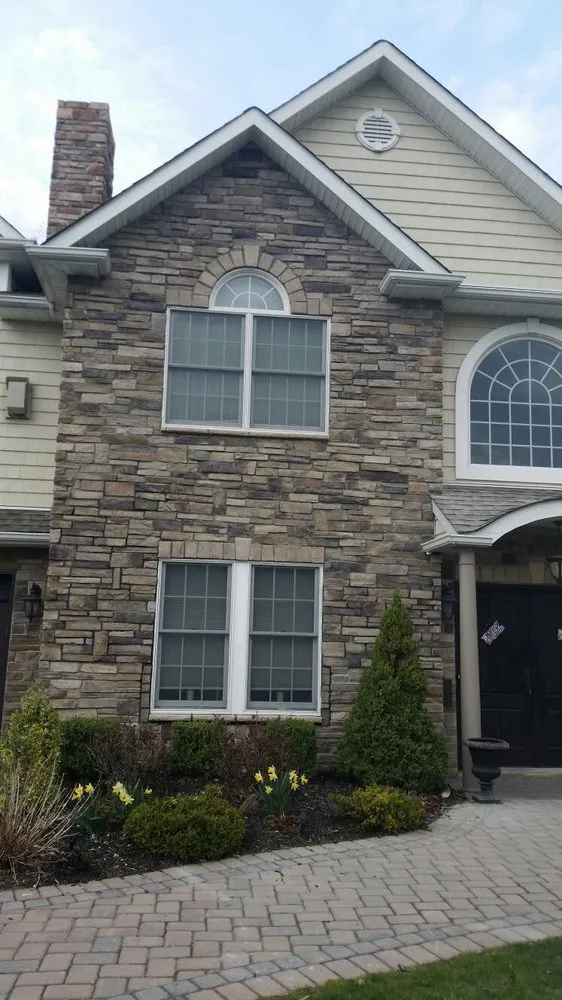 Expert outdoor landscaping for homes in Orange, NJ by Ceasar General Construction and Landscaping