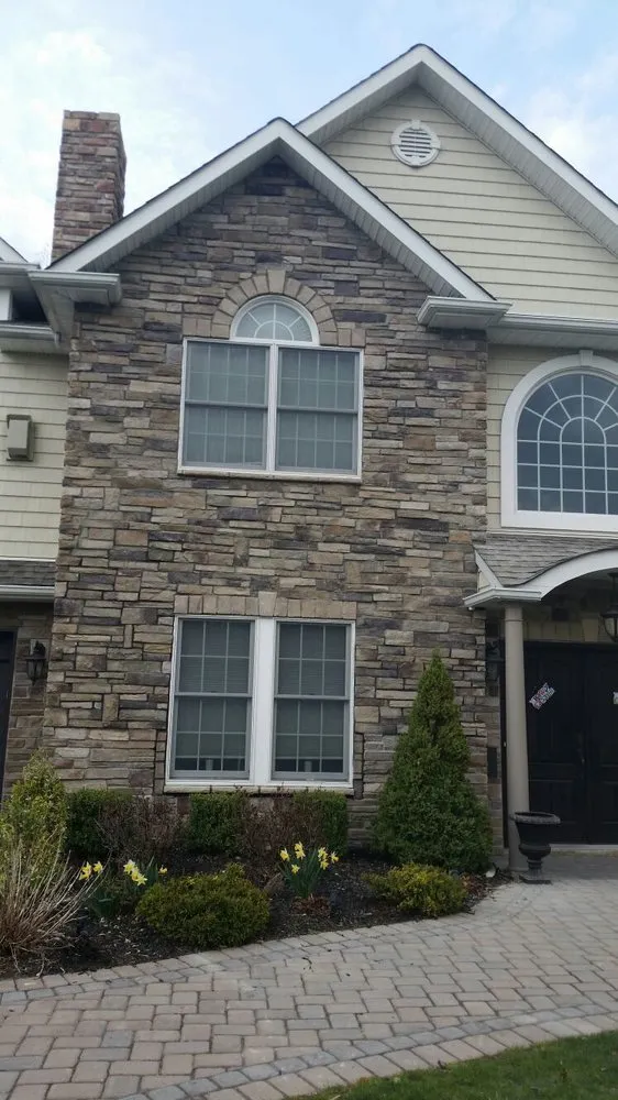 Custom lawn mowing service for year-round maintenance in Orange, NJ by Ceasar General Construction and Landscaping