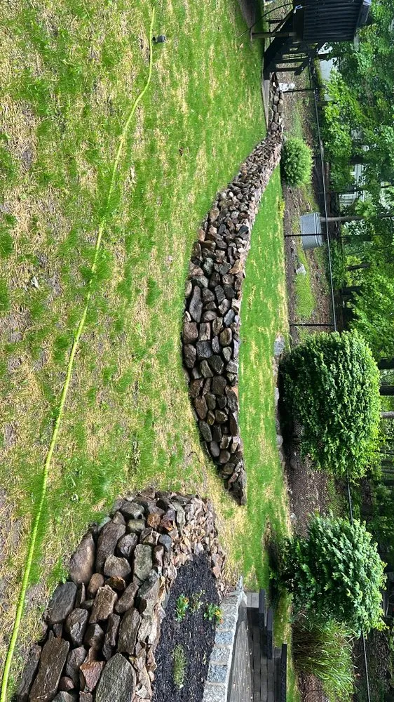 Custom landscape installation for year-round maintenance in Rockaway, NJ by Celtic Masonry and Paving