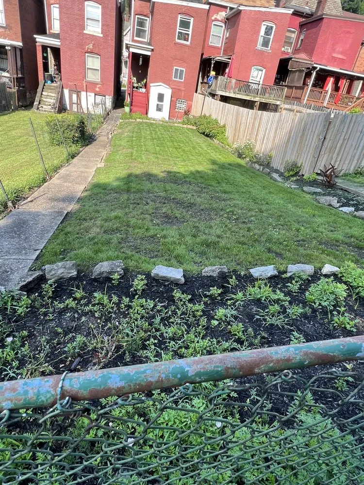 Professional yard maintenance for residential properties in Pittsburgh, PA by Centillion Landscaping