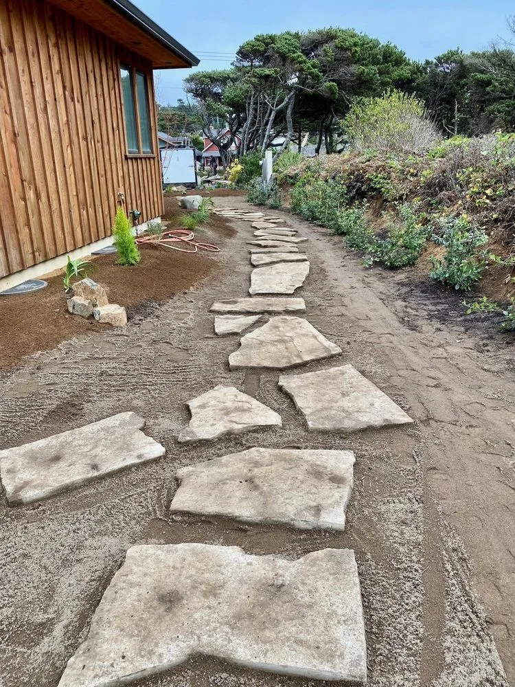 Local landscape installation for year-round maintenance in Newport, OR by Central Coast Landscaping