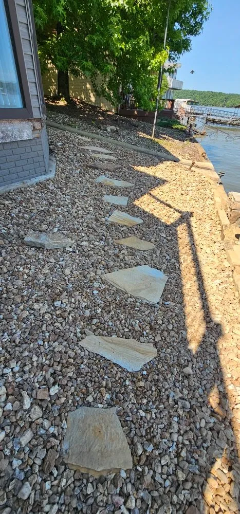 Custom landscape installation in Osage Beach, MO by Cerbero Landscaping & Clearing