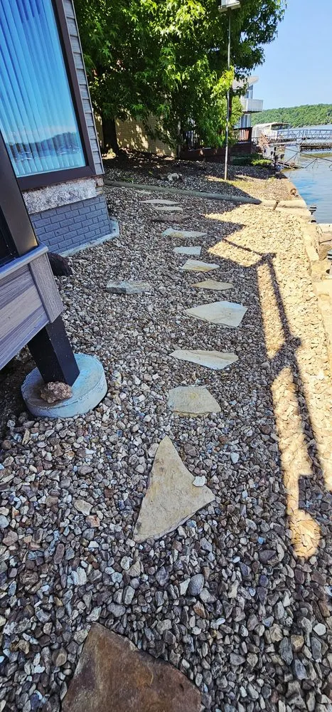 Custom lawn mowing service with custom design across Osage Beach, MO - Cerbero Landscaping & Clearing