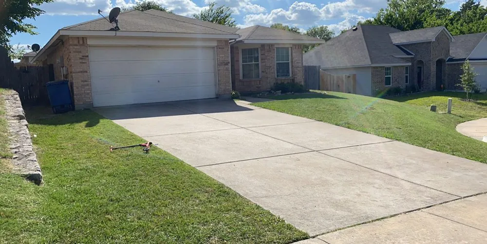 Affordable landscape design for year-round maintenance in Dallas, TX by Certified Bandit Lawn Care