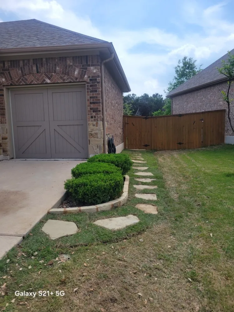 Professional landscape design for year-round maintenance in Spicewood, TX by Cesar Godinez Services