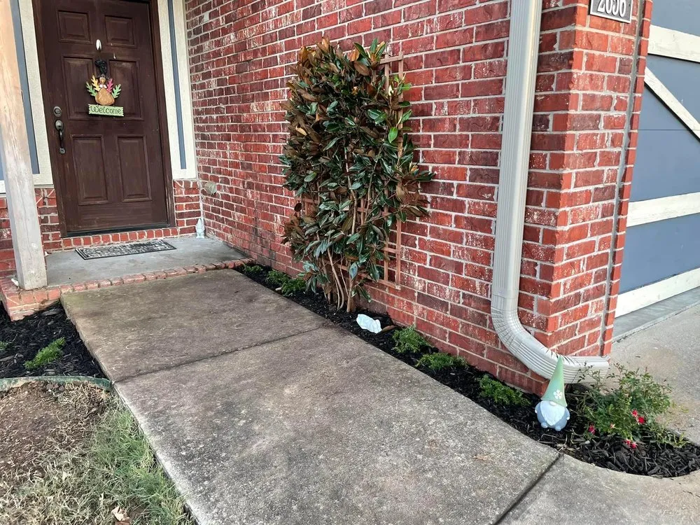 Affordable residential landscaping with custom design in Lowell, AR by Cew Landscape