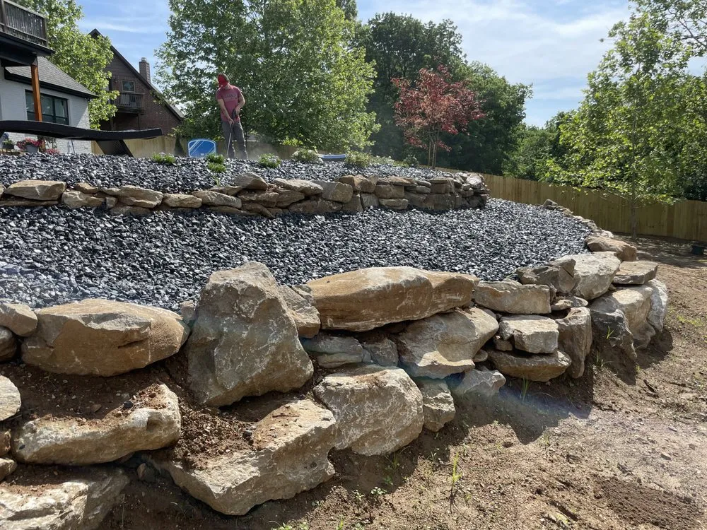 Affordable yard maintenance with custom design in Lowell, AR by Cew Landscape