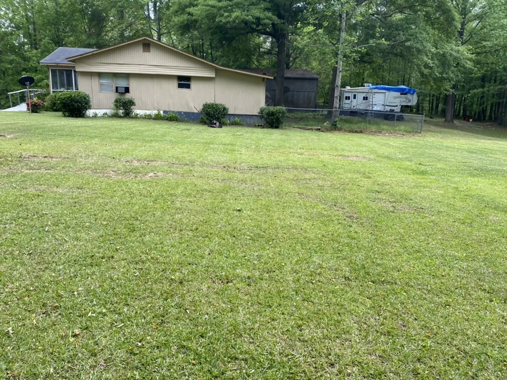 Custom residential landscaping for homes in Forsyth, GA by CGs landscaping and more