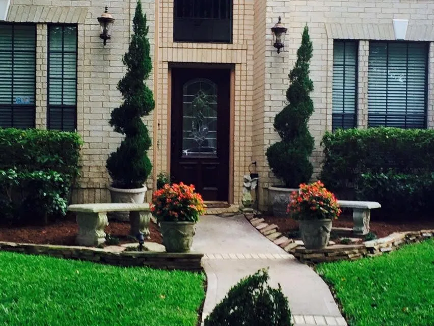 Professional landscape design with custom design in Cypress, TX by C&H Landscape & Lawn Service