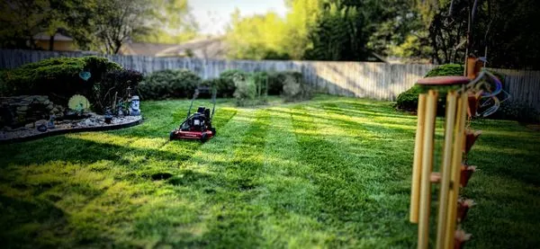 Chad Rhodes Lawn & Landscape Logo