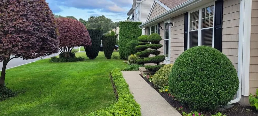 Professional yard maintenance for residential properties in Woonsocket, RI by Chad's Landscaping
