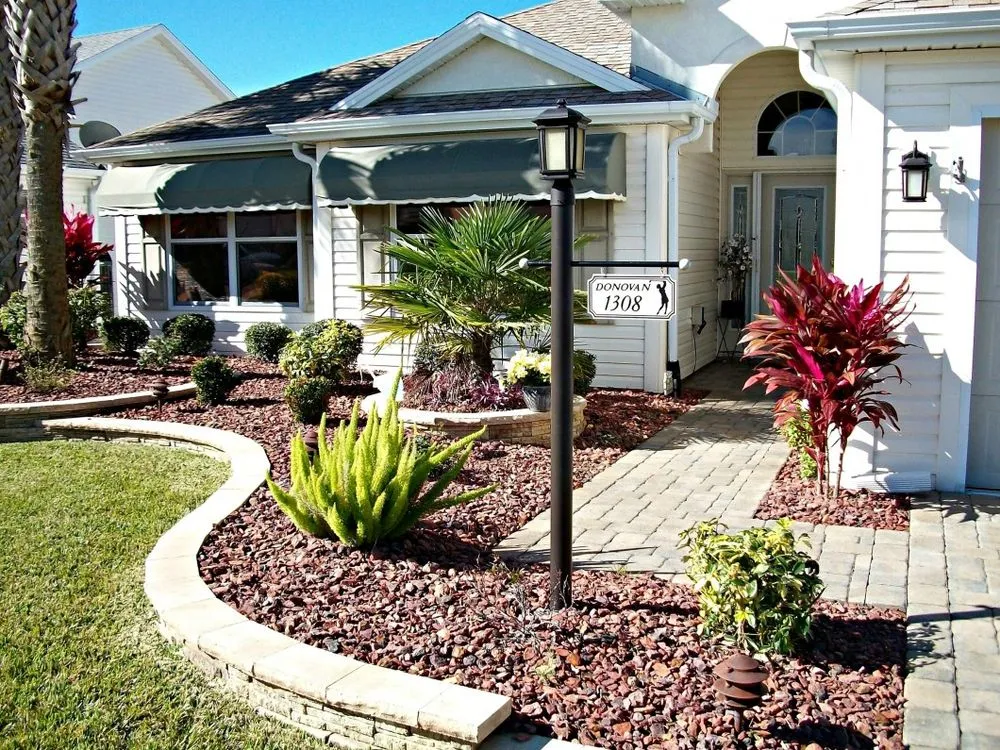 Custom landscape design with custom design in Summerfield, FL by Chad's Lawn and Landscaping