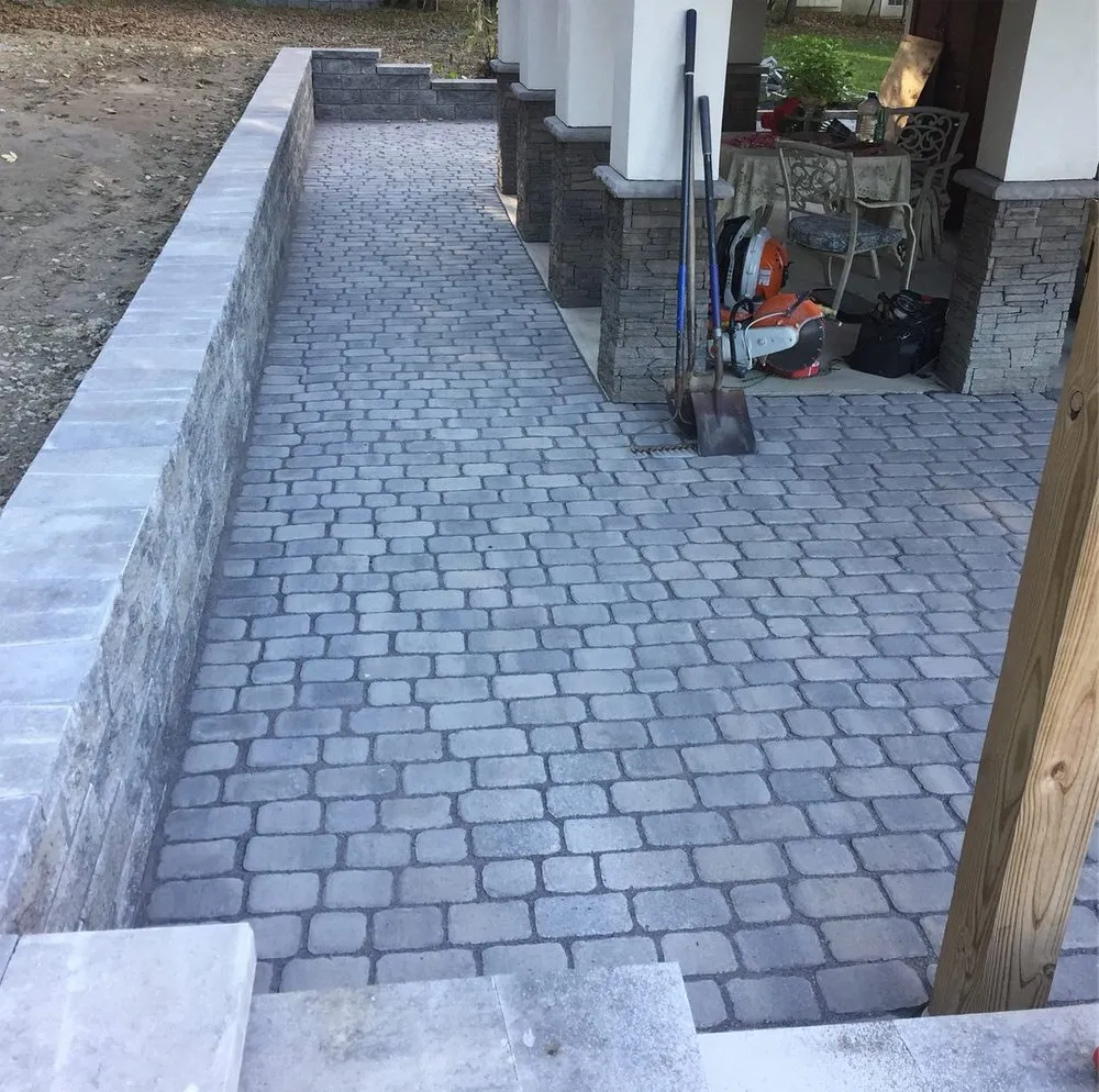 Professional landscape installation for residential properties in Latham, NY by Chameleon Property Services
