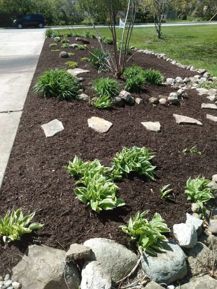 Expert yard maintenance for beautiful yards in Valparaiso, IN by Champ Landscaping