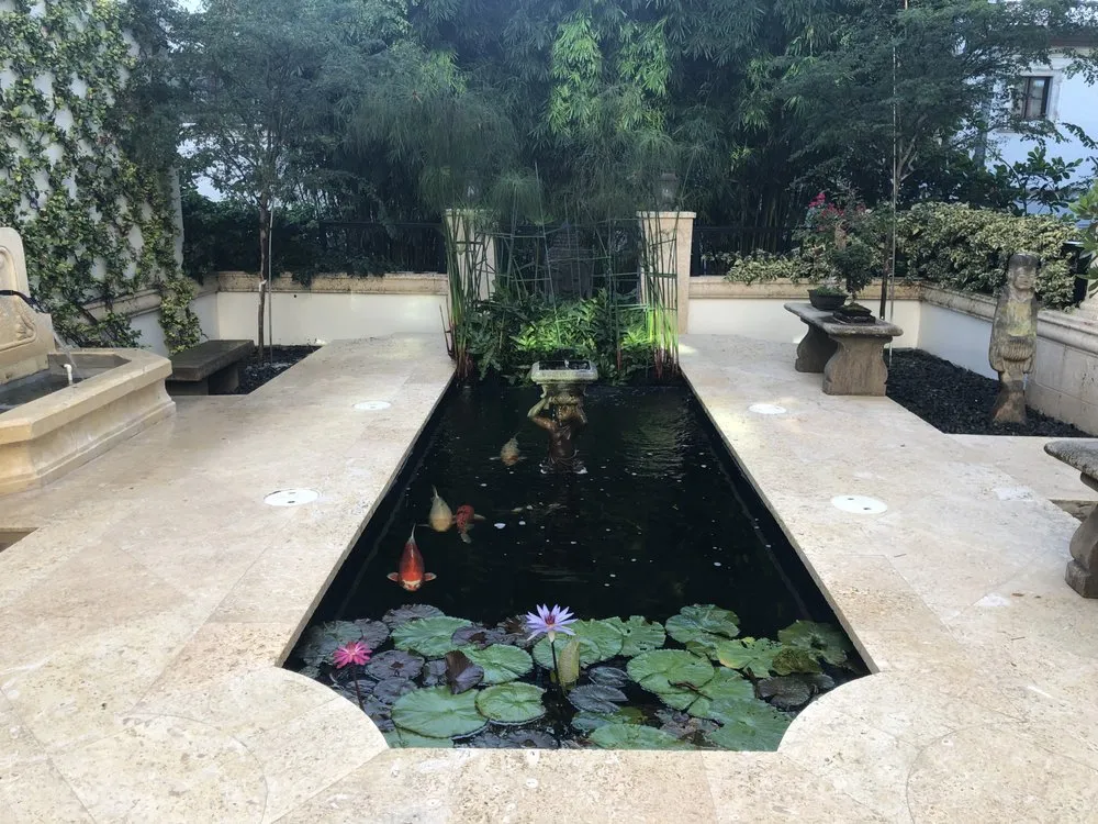 Top-rated landscaping services with custom design in Miami, FL by Champion Bobcat & Excavator Services