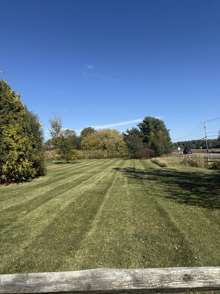Local lawn mowing service for outdoor upgrades in Milton, VT by Champlain Landscaping