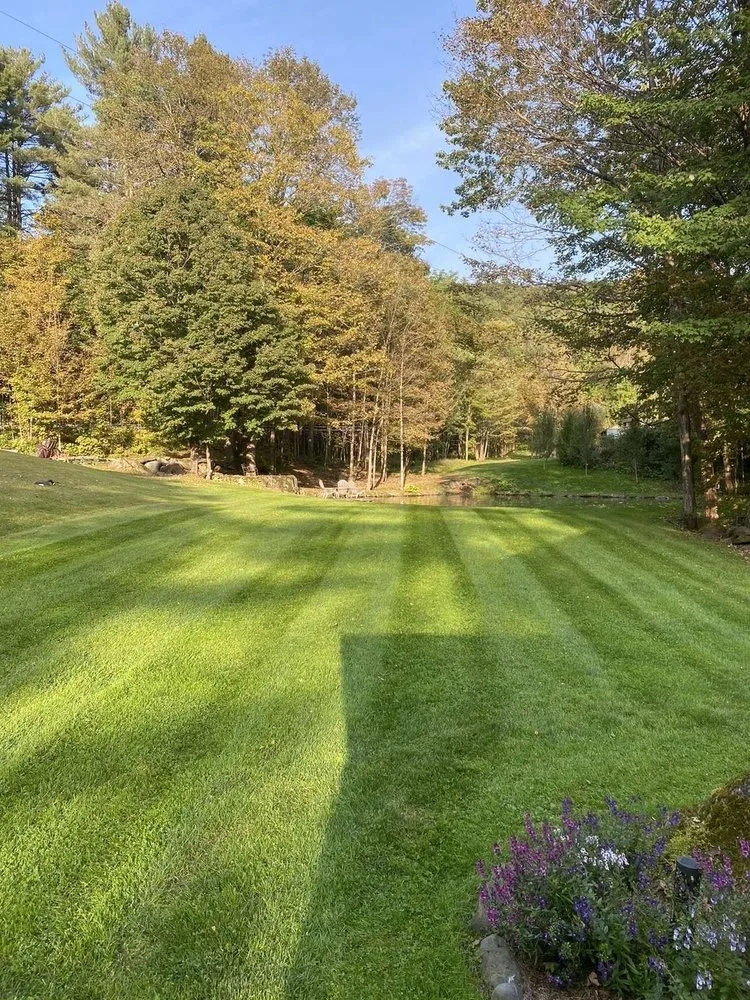 Top-rated lawn mowing service for homes in Milton, VT by Champlain Landscaping