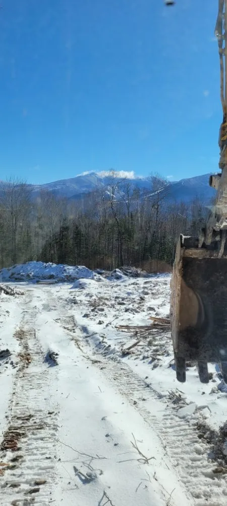 Professional lawn mowing service for year-round maintenance across Goffstown, NH - Chandler Construction