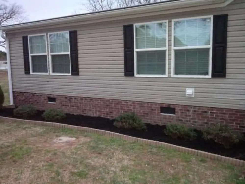 Expert garden landscaping for residential properties in Wilson, NC by Charities and Trimmings