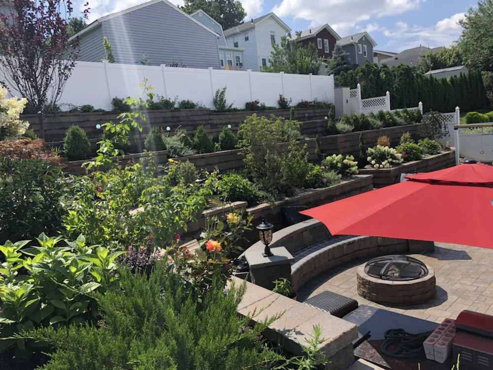 Professional lawn care service for residential properties in West Orange, NJ by Charles & Son Construction & Landscaping