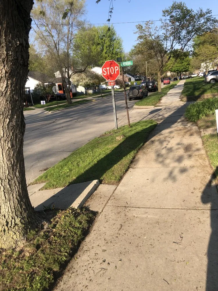 Custom residential landscaping with custom design in Roseville, MI by Charles Landscaping