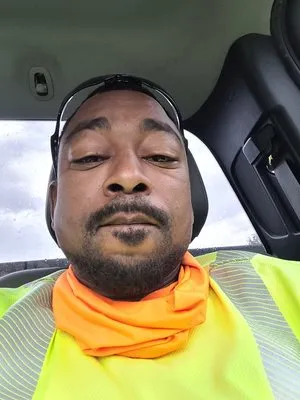 Charles Oldham Jr. Lawn Mowing Service Logo