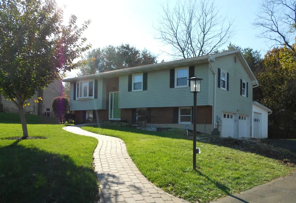 Custom residential landscaping with custom design in Bangor, PA by Charlie Nansteel Tree & Excavation