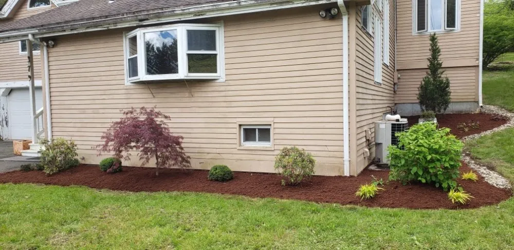 Trusted lawn mowing service for homes in Waterbury, CT by Charlie's Lawncare