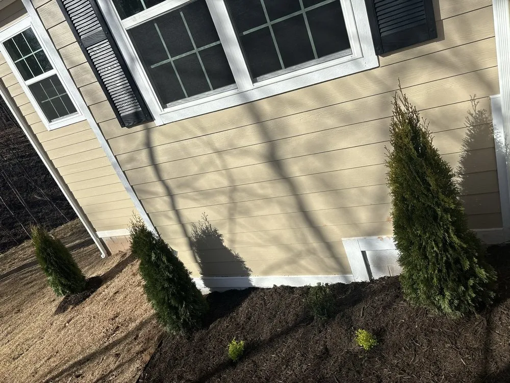 Affordable landscape design for residential properties in Rogers, AR by Charlys Lawn Care