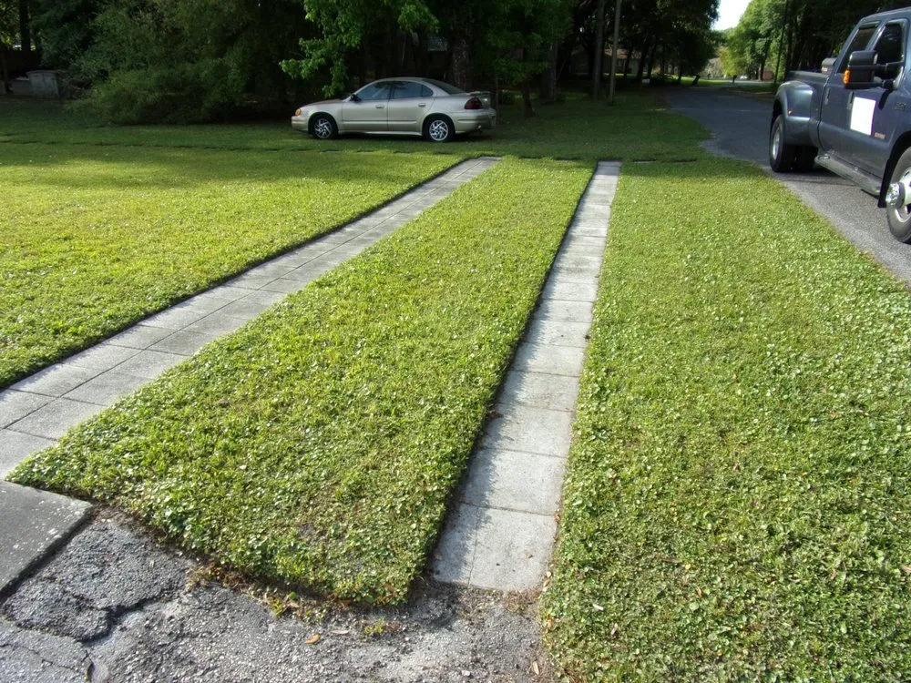 Custom garden landscaping with custom design in Brooksville, FL by Chartier Mowing Services