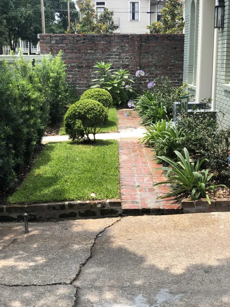 Custom landscape installation for residential properties in New Orleans, LA by Chase The Gardener