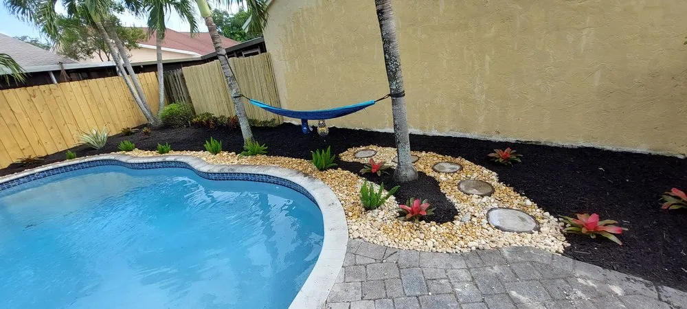 Custom landscaping services for year-round maintenance across Hollywood, FL - Checkmate Finishings