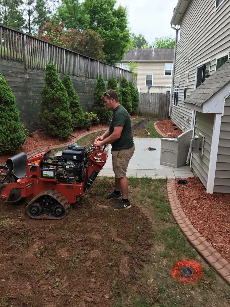 Custom lawn mowing service for outdoor upgrades in Woodstock, GA by Cherokee Tree & Landscape