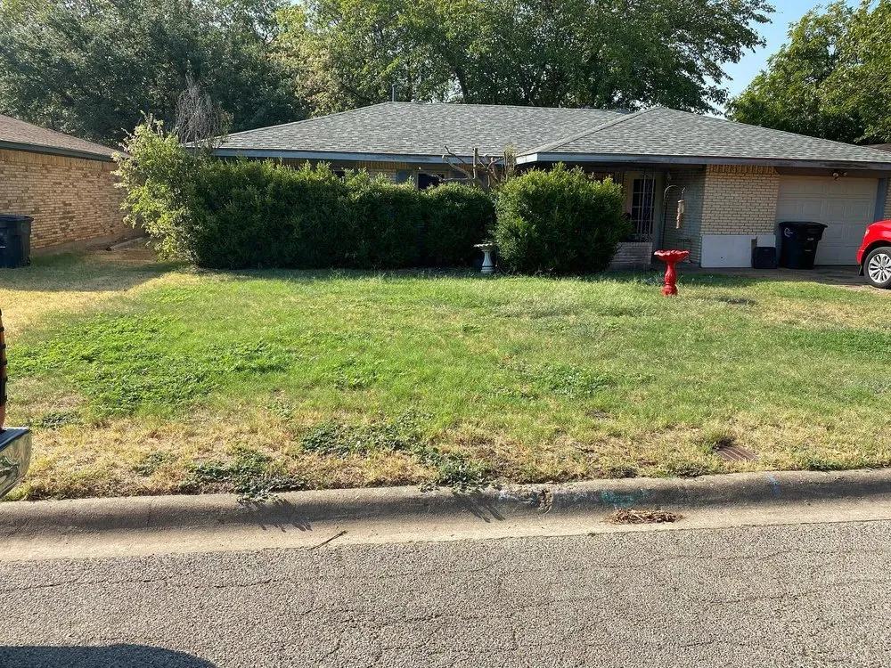 Custom landscape installation for beautiful yards in Keene, TX by Cherry Services