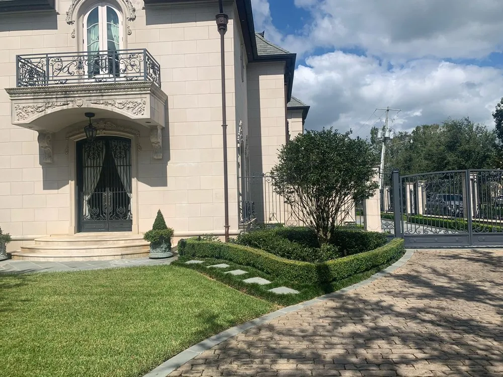 Expert lawn mowing service with custom design in Gulfport, MS by Chnaro Landscaping