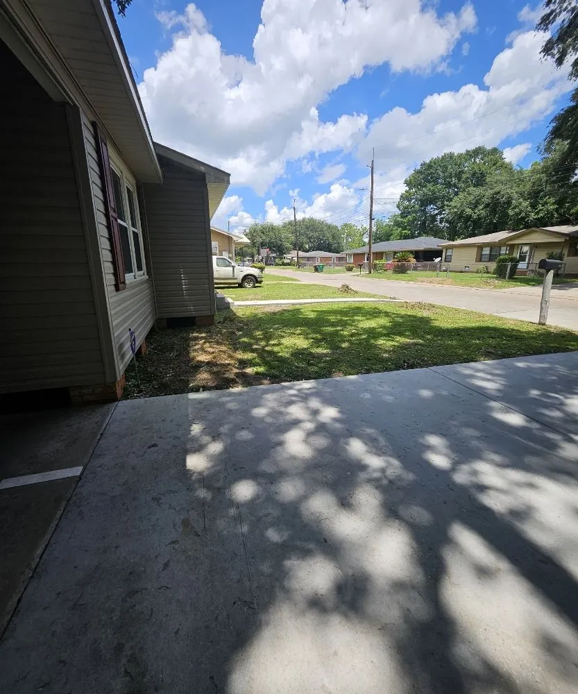 Affordable lawn mowing service for homes in Lafayette, LA by Choate Brothers Handyman Service