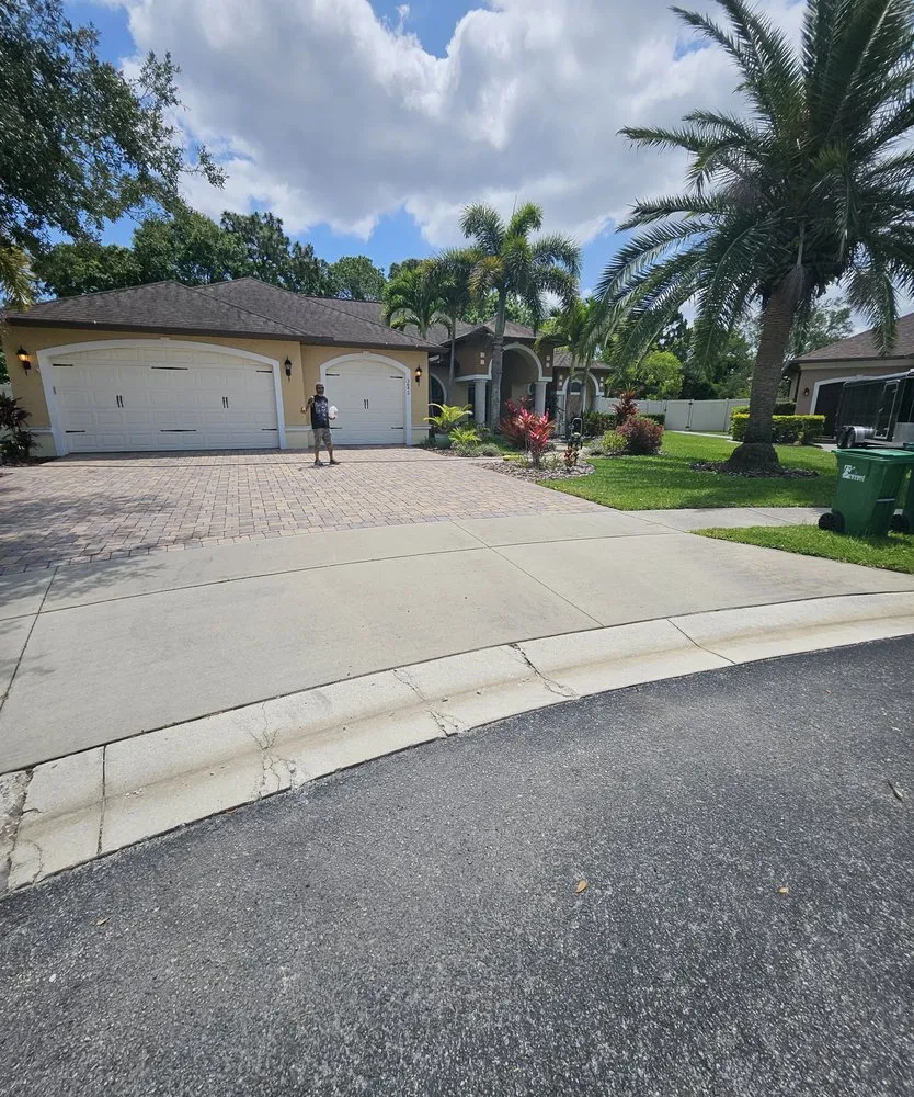 Professional lawn mowing service for homes in Lafayette, LA by Choate Brothers Handyman Service