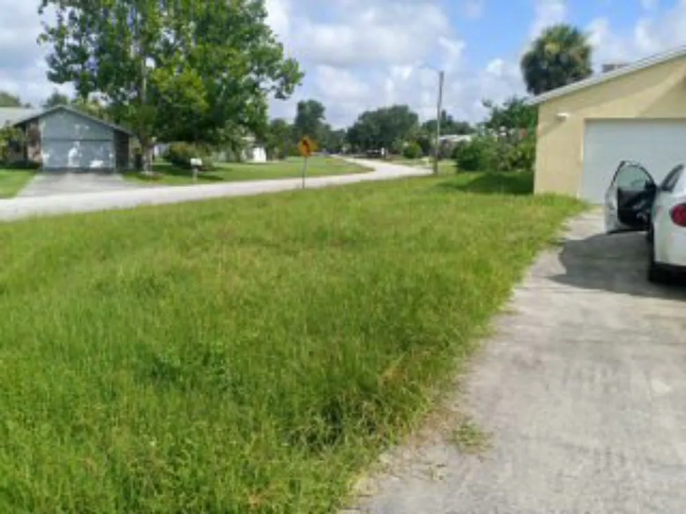 Local lawn care service with custom design in Melbourne, FL by Chop It Up Landscaping