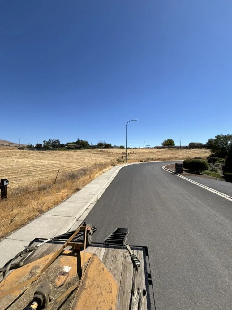 Custom landscaping services for year-round maintenance in Selah, WA by Chouinards Field & Brush Mowing