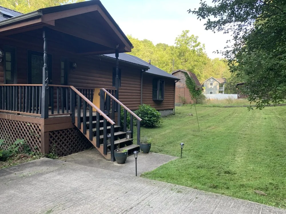 Affordable yard cleanup service in Mount Hope, WV by Chris Enterprises