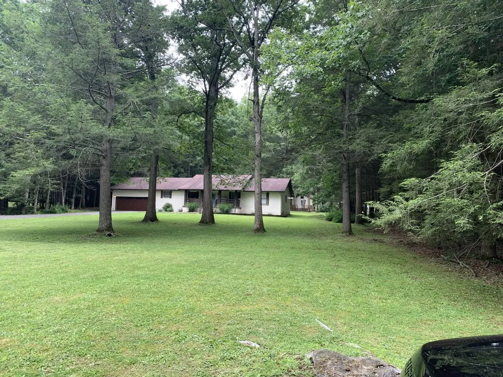 Affordable yard maintenance experts serving Mount Hope, WV - Chris Enterprises