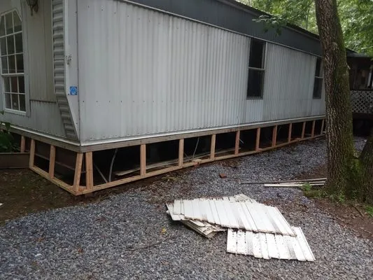 Chris Lawn Care And Remodeling Logo