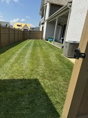 Chris Lawn Care Services Logo