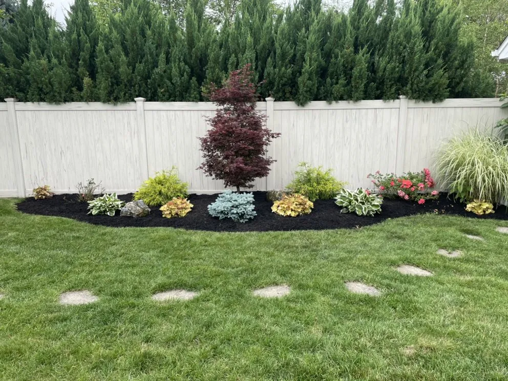 Expert landscaping services for beautiful yards in Hicksville, NY by Chris's Lawn Service