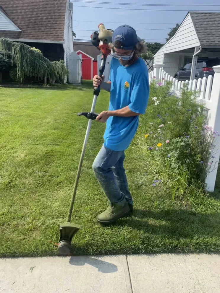 Affordable landscaping services for year-round maintenance in Hicksville, NY by Chris's Lawn Service