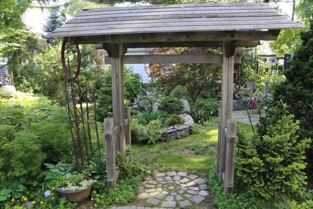 Reliable lawn care service for residential properties in Hyde Park, MA by Christie Dustman & Company