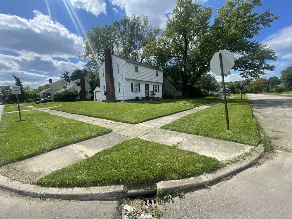 Custom residential landscaping for year-round maintenance across Flint, MI - Christopher & Brothers Lawn Service